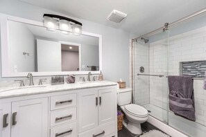 Shower, hair dryer, shampoo