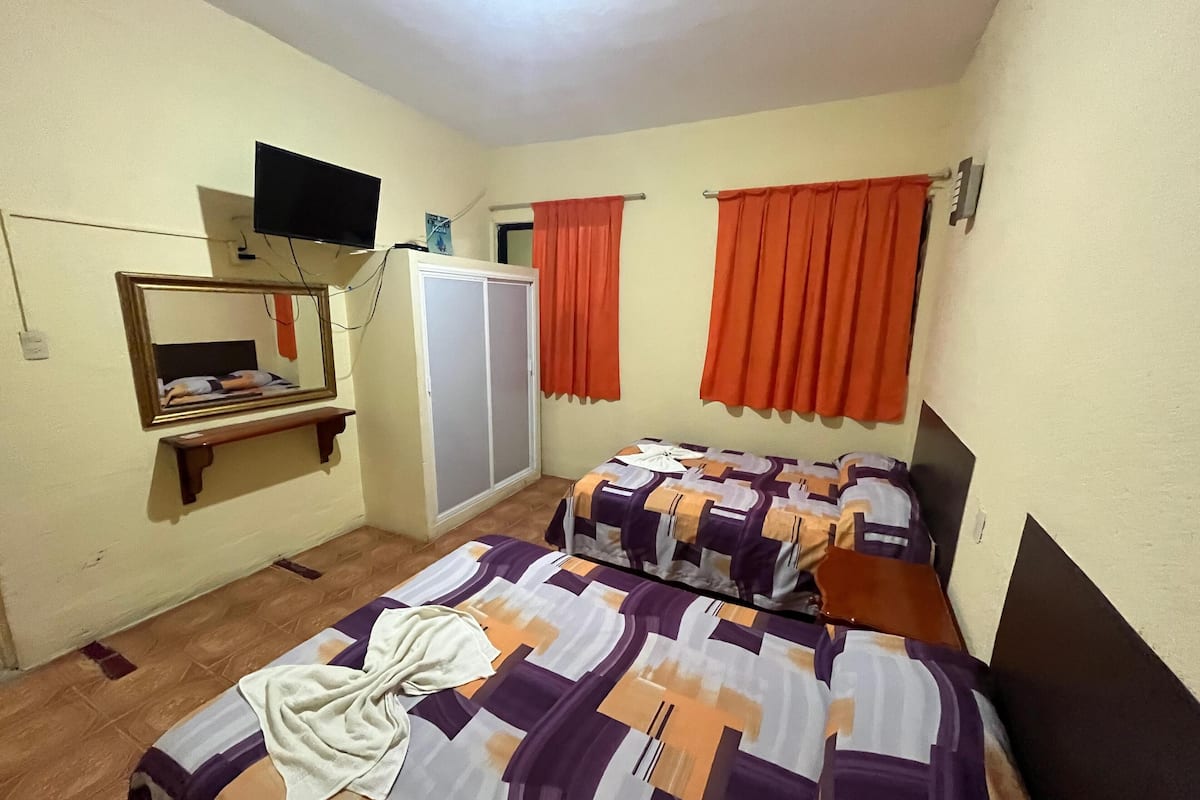 Laptop workspace, free WiFi, bed sheets