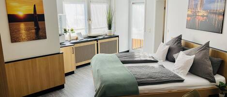 1 slaapkamer, een strijkplank/strijkijzer, wifi, beddengoed