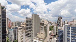 A high-rise urban area with multiple buildings, including residential and commercial structures. - Setin Downtown Genebra by Viva - Apartamentos completos na Bela Vista com piscina (São Paulo)