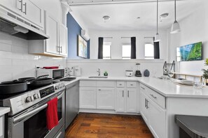 Fridge, microwave, oven, stovetop - Downtown located large studio 20 mins to NYC (Newark)