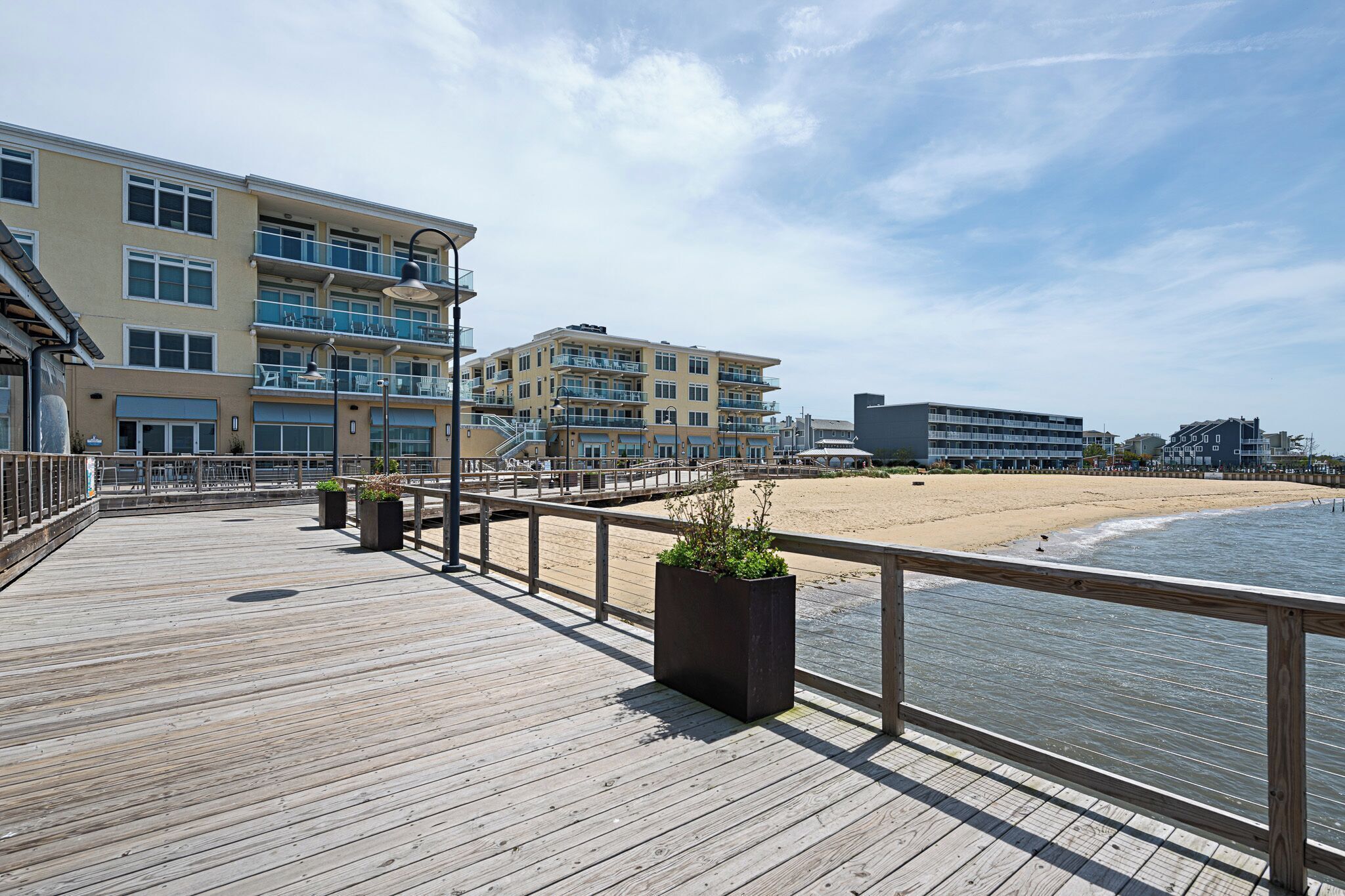 View of bay and bay beach from boardwalk