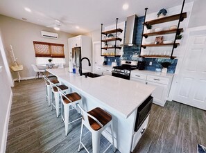 Fridge, microwave, oven, stovetop - Hidden Beach Bungalow - Walk to the beach, shops and great eats! (New Smyrna Beach)