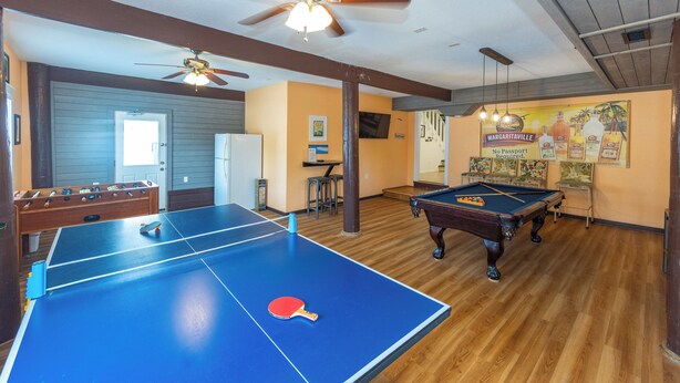 A room with a ping pong table, a pool table, and a foosball table. - 4 Play- 5 Bd., Dog Friendly, Game Rm., Private Pool, Easy Bch Access (Virginia Beach)
