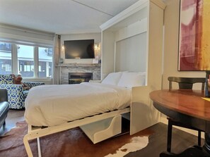 1 bedroom, desk, iron/ironing board, travel crib