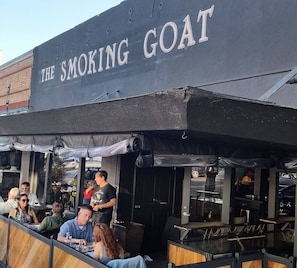Enjoy dining al fresco at The Smoking Goat, where outdoor seating offers a relaxed atmosphere.