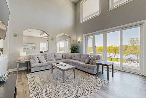 TV - Charming dog-friendly lakefront villa with private dock, firepit, stunning views (Orange)