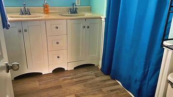 Hair dryer, towels, soap, shampoo