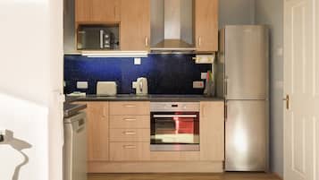 City House | Private kitchen | Full-sized fridge, microwave, oven, stovetop