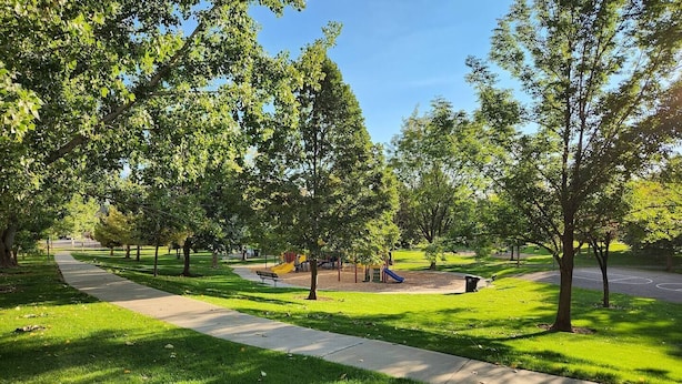 A park with a playground, a paved walkway, and trees. - Clean, Quiet 2 Bdrm near Provo w/ Direct Access to City Park

 (Springville)