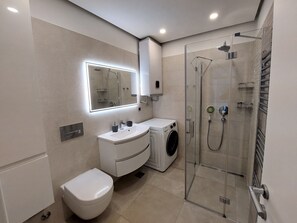 Hair dryer, towels, soap, toilet paper