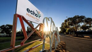 A sign for Echo Holiday Parks with a clear sky and sunlight in the background. - Echo Holiday Parks - Port Pirie (Solomontown)