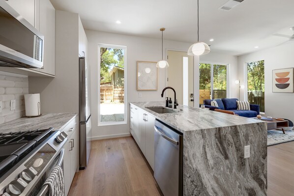 Fridge, microwave, oven, stovetop - New Home on the East Side: Close to Downtown! (Austin)