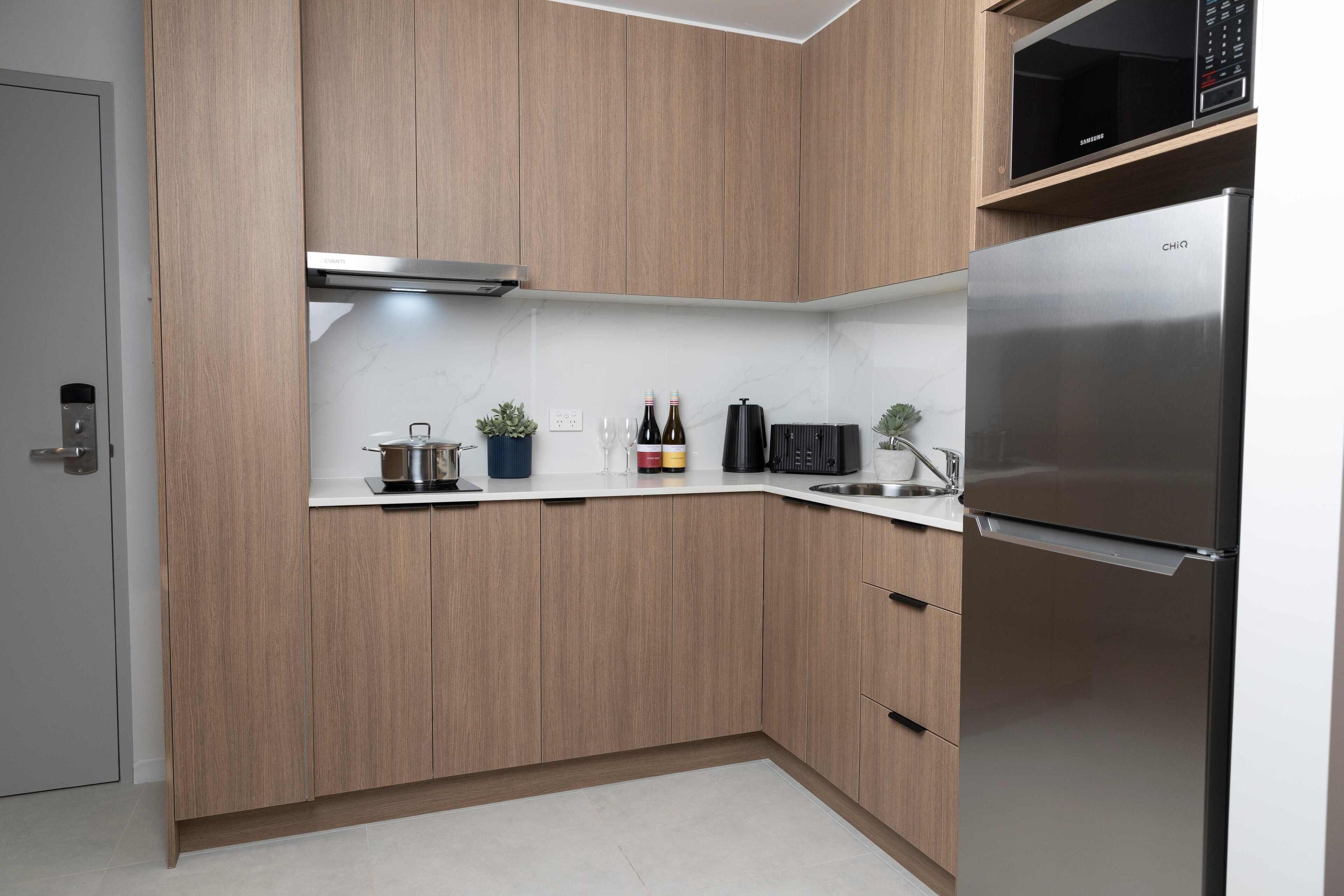 Apartment | Private kitchen | Full-sized fridge, microwave, stovetop, espresso maker