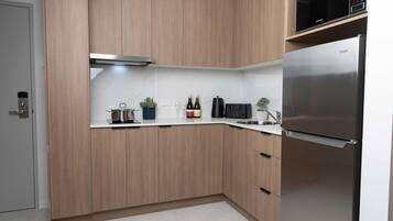 Apartment | Private kitchen | Full-sized fridge, microwave, stovetop, espresso maker