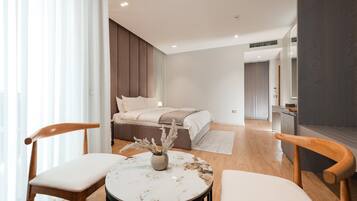 Panoramic Double Room, City View | Living area | 43-inch Smart TV with cable channels