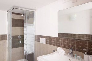 Shower, eco-friendly toiletries, hair dryer, bidet