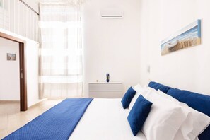 2 bedrooms, in-room safe, iron/ironing board, travel cot