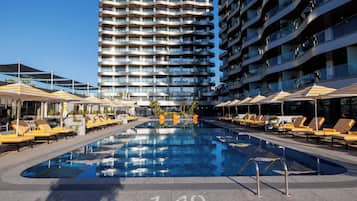 Indoor pool, seasonal outdoor pool, pool umbrellas, sun loungers