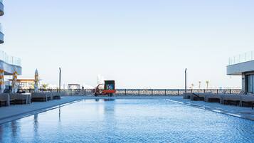 Indoor pool, seasonal outdoor pool, pool umbrellas, pool loungers