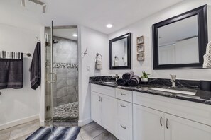 Shower, hair dryer, towels