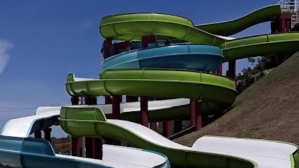 A water park with multiple water slides.