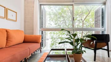 Comfort Apartment | Living area | 20-inch LCD TV with digital channels, Netflix, streaming services