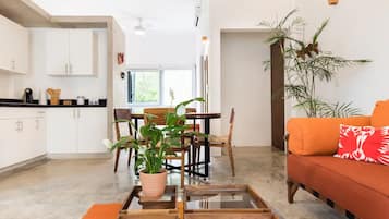 Comfort Apartment | Living area | 20-inch LCD TV with digital channels, Netflix, streaming services