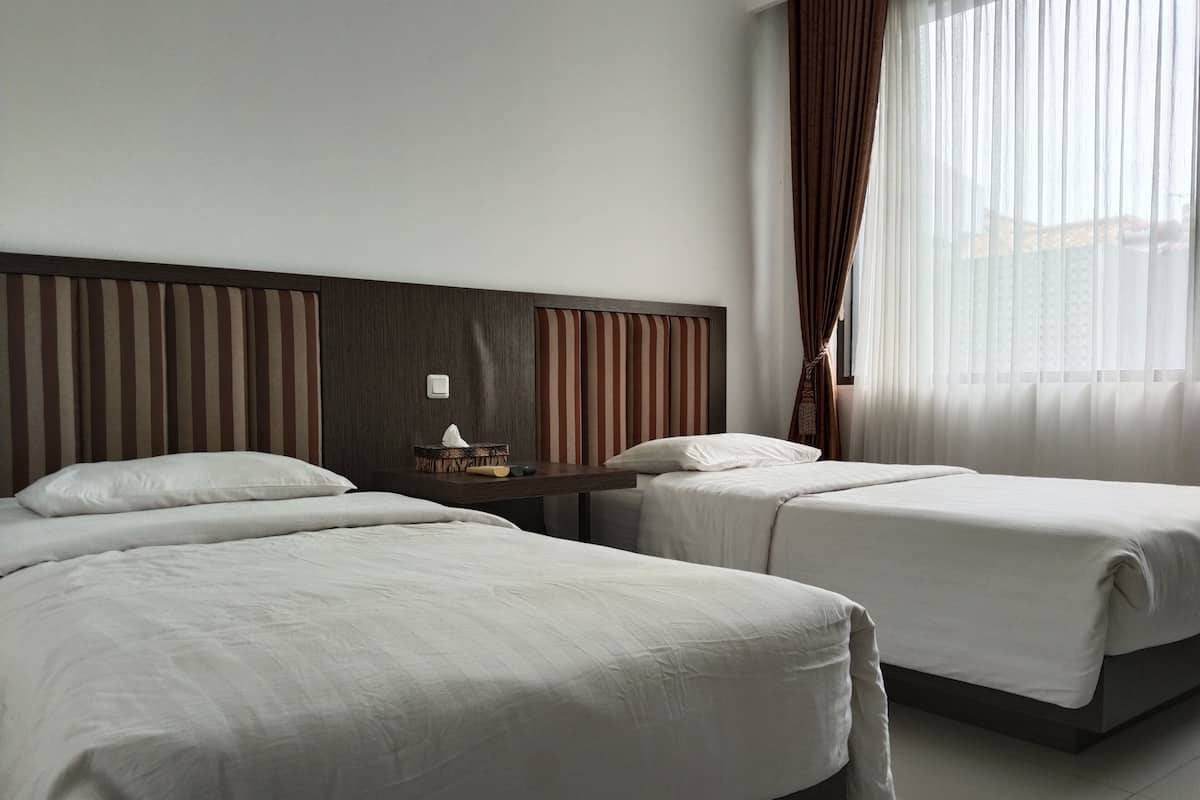 Habitación con 2 camas individuales | Ropa de cama