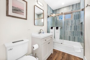 Hair dryer, towels, soap, shampoo