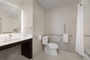 A modern bathroom with a toilet, bidet, and a shower area. - Residence Inn by Marriott Kenwood Cincinnati (Cincinnati)
