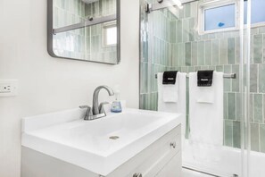 Hair dryer, towels, soap, shampoo