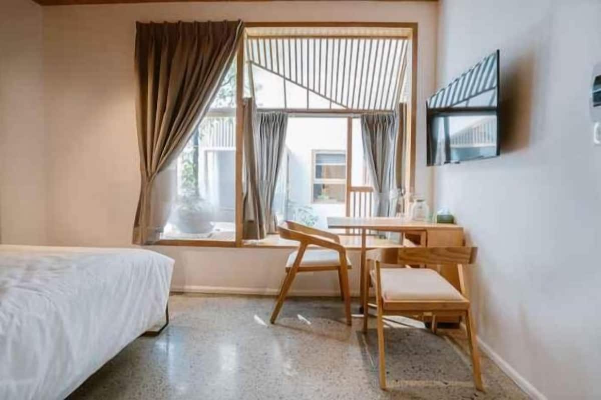 Pillow-top beds, desk, blackout curtains, soundproofing