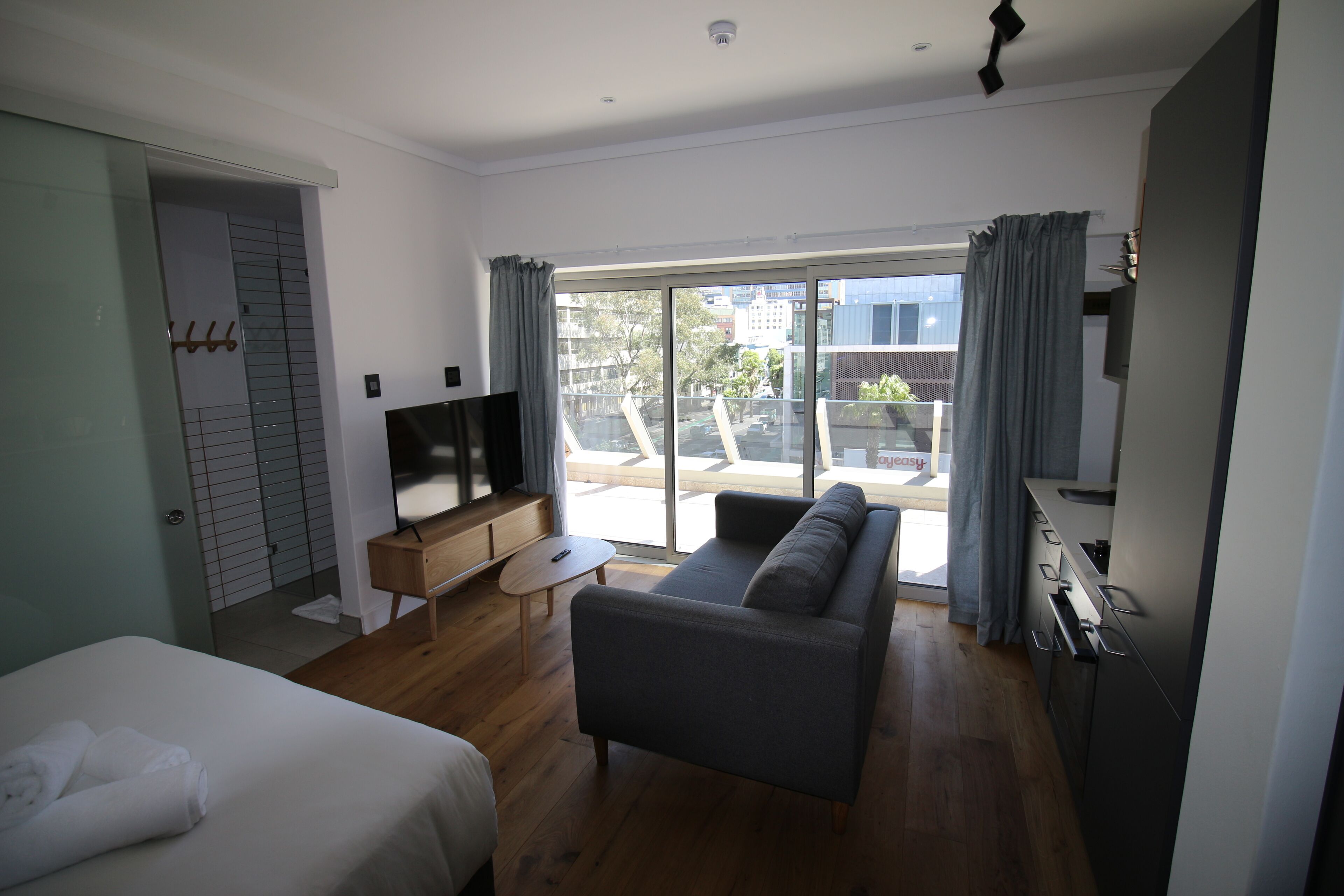 Studio, 1 Bedroom, City View | Living room. Studio Apartment With Balcony