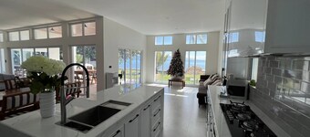 Beachfront. Direct access to safe sandy beach. 