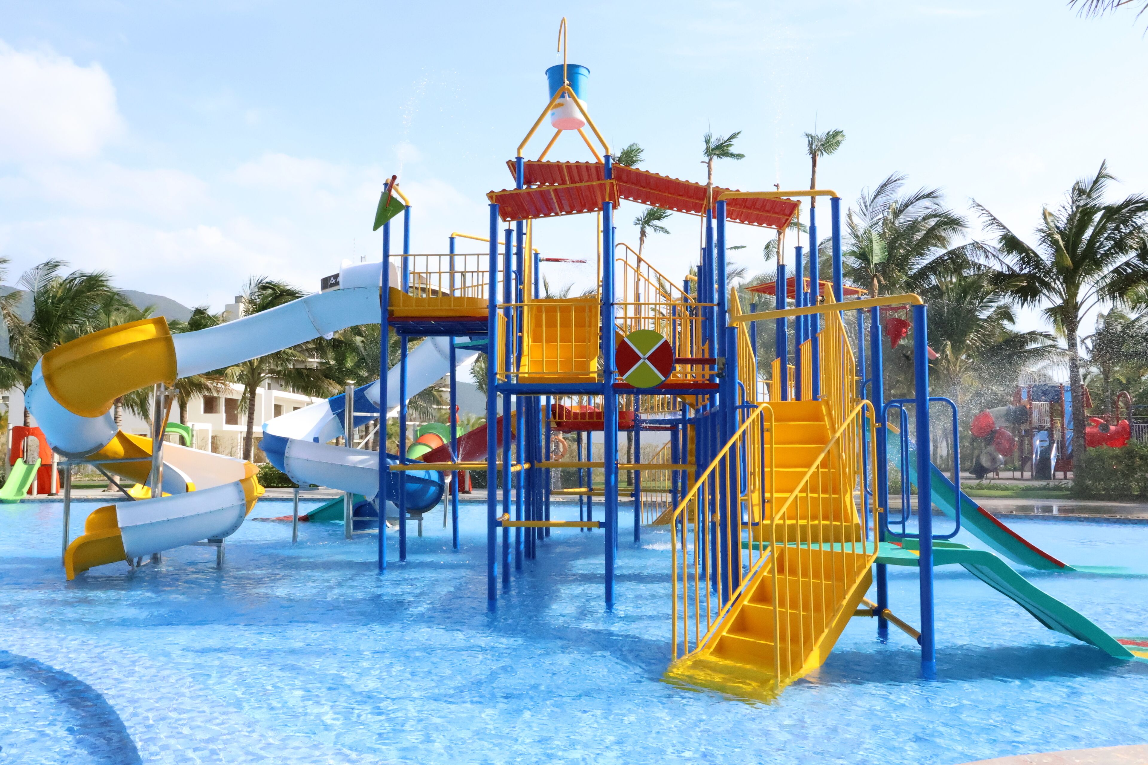 A water park with multiple slides and play structures.