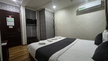 Kahden hengen economy-huone (yksi tai kaksi sänkyä) | Ilmainen Wi-Fi, vuodevaatteet