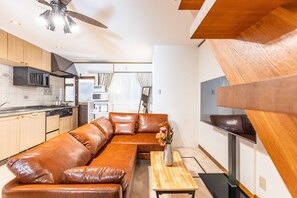 Casa Deluxe | Area soggiorno | TV a schermo piatto