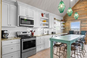 Fridge, microwave, oven, stovetop - Waterfront Escape w/ Views | Shared Pool & Boat Dock | Orange Crush by AvantStay (Corpus Christi)
