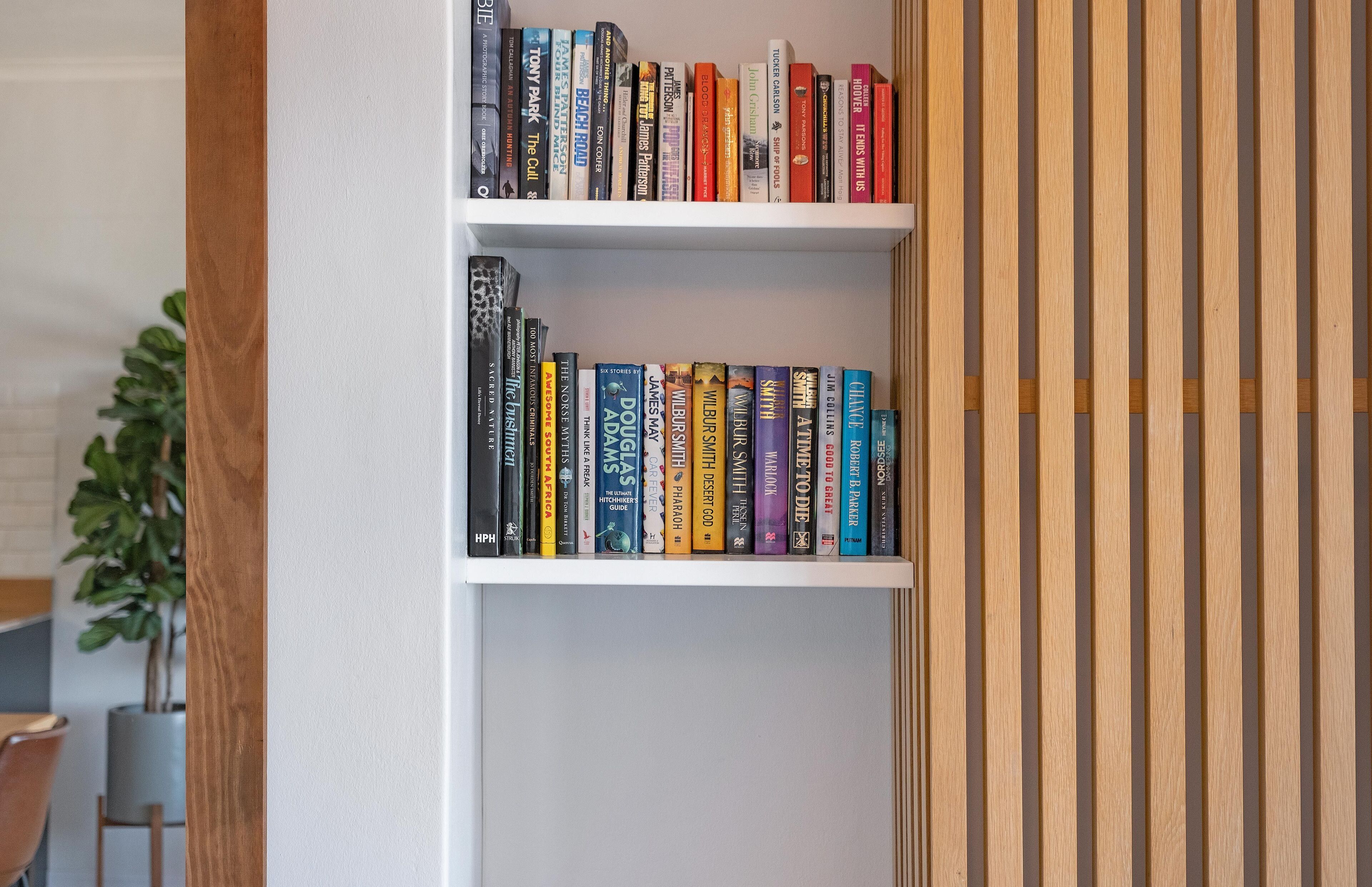 A bookshelf with books.