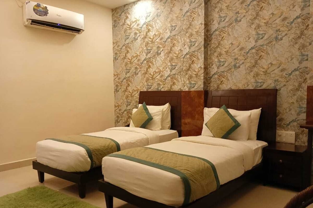 Habitación Deluxe con 2 camas individuales | 1 dormitorio, sábanas de algodón egipcio, ropa de cama de alta calidad