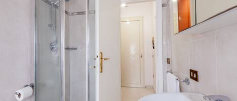 Shower, bidet, toilet paper