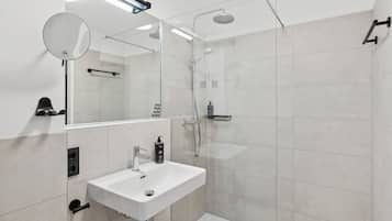 Queen Room with sofa bed | Bathroom | Eco-friendly toiletries, hair dryer, towels, soap
