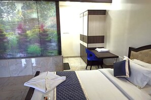 Suite | Iron/ironing board, bed sheets - Dundi Mango Mist Resort (Tumkur)