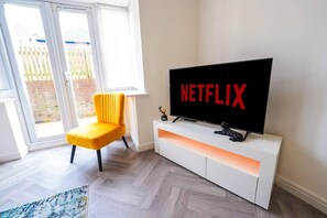 Ferienhaus | Wohnbereich | Fernseher