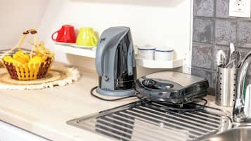 Appartement | Cuisine privée | Grille-pain, serviettes en papier