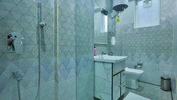 Shower, free toiletries, hair dryer, bathrobes
