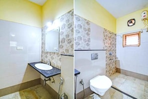 Habitación Deluxe doble, vistas a la ciudad | Baño | Ducha y cabezal de ducha tipo lluvia