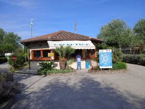 Enjoy a meal at this charming eatery surrounded by lush greenery.