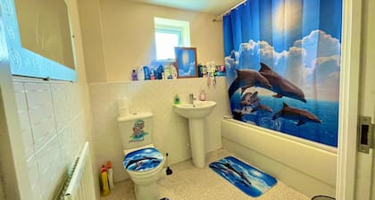 Spacious room with study table next to university